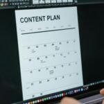 Close-up of digital content plan on laptop screen, ideal for scheduling visuals.